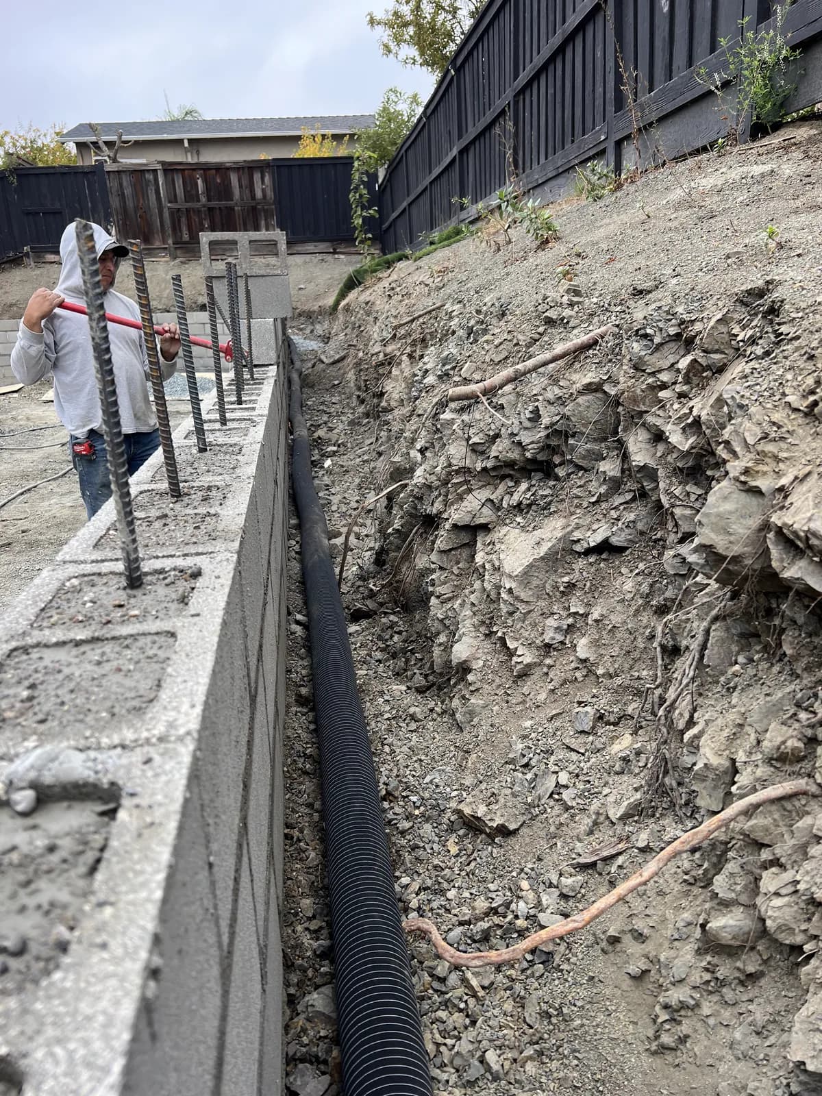 Drain pipe running along a new wall footing